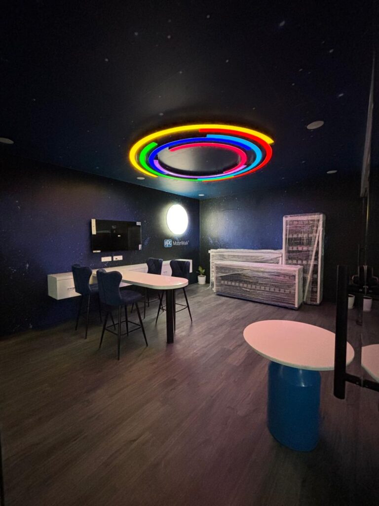 Interior view of PPG Linq retail store showcasing custom layout, finishes, and branding by 4Pz